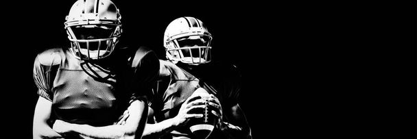 American Football Player isolated on black background  - Фото, зображення