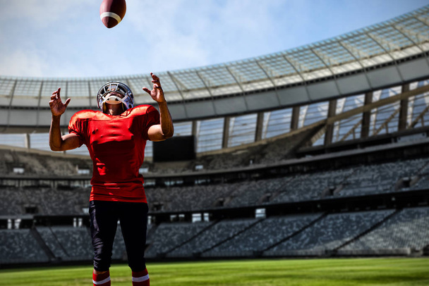 American Football Player against rugby stadium on a sunny day - Photo, image