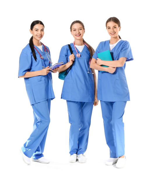 Female medical students on white background - 写真・画像
