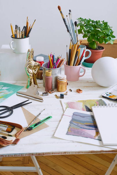 Workspace of designer illustrator with materials and equipment  - Фото, зображення