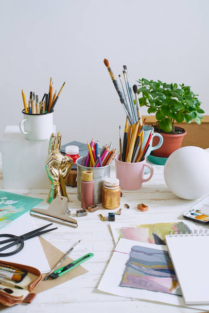 Workspace of designer illustrator with materials and equipment  - Φωτογραφία, εικόνα