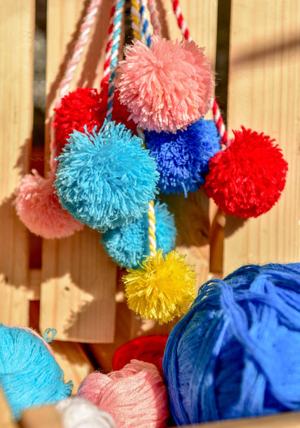 fluffy pom poms with multi-colored threads - Photo, Image