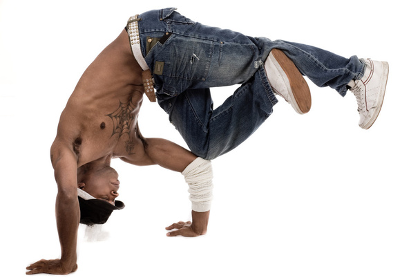 Dancer balancing his knees with his elbows - Фото, изображение