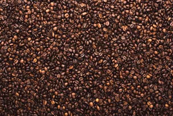 焼き立てコーヒー豆の上からの眺め背景 - 写真・画像