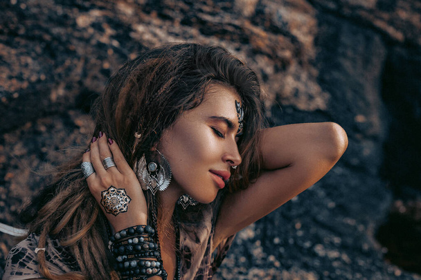 beautiful young woman with long hair with boho accessories - Fotoğraf, Görsel