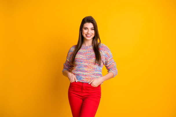 Portrait of content candid pretty girl enjoy spring holidays weekends put hands pocket wear modern pullover clothes isolated over vivid color background - Photo, image