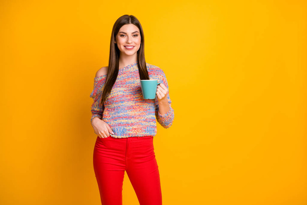 Portrait of content dreamy girl have enjoy weekends holidays hold caffeine latte mug wear good look comfort cozy jumper isolated over vivid color background - Fotó, kép
