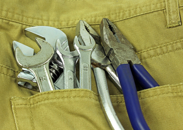 Инструменты в кармане
 - Фото, изображение
