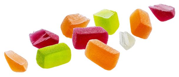 Падіння фруктових мармеладних цукерок ізольовано на білому тлі
 - Фото, зображення