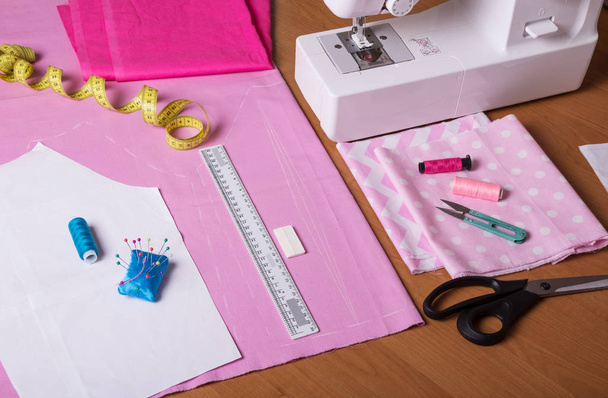 Sewing machine, paper sample on fabric and scissors - Fotografie, Obrázek
