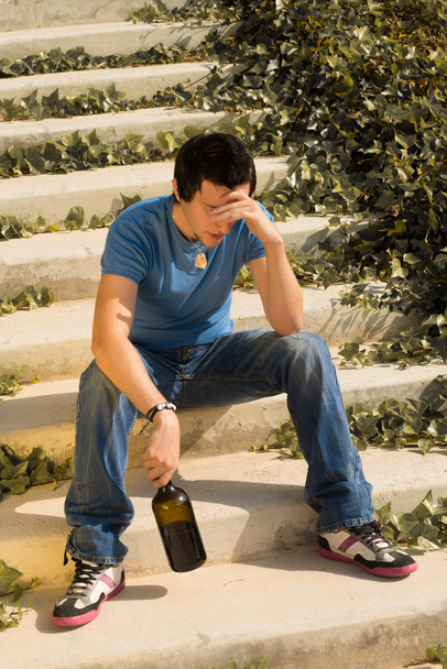 Worried guy drinking - Fotó, kép