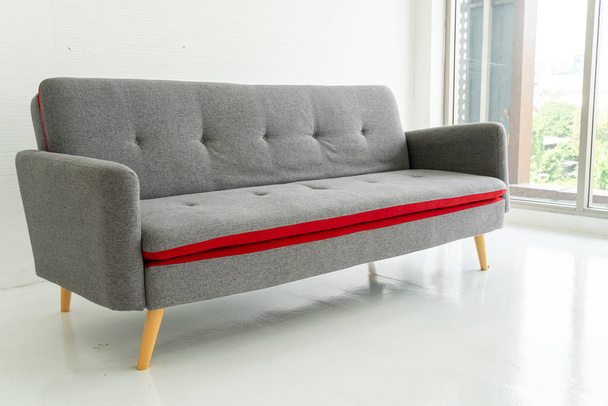 grey sofa in living room  - Фото, зображення