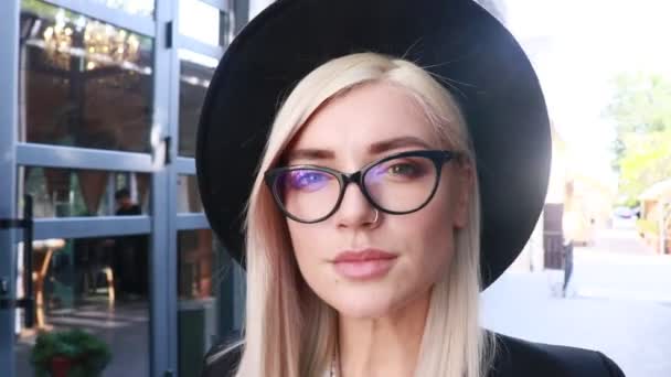 blonde woman in fashionable clothes outdoors - Felvétel, videó
