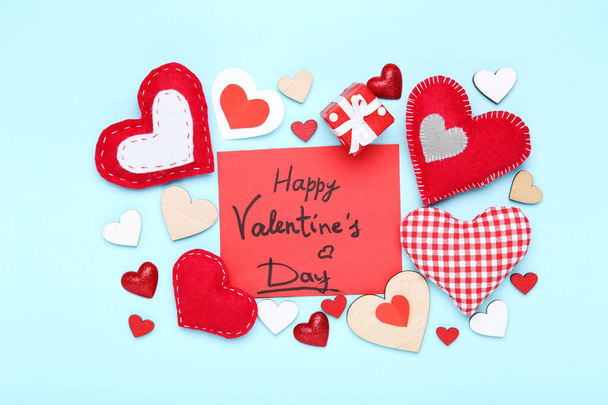 Valentine hearts with gift box and text Happy Valentines Day on  - Photo, Image