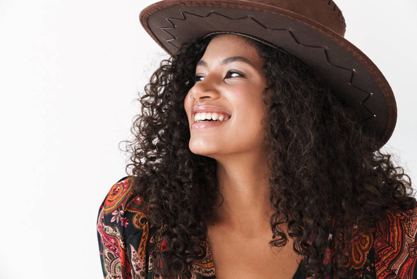 Beautiful cheerful young woman wearing cowboy hat - Fotó, kép