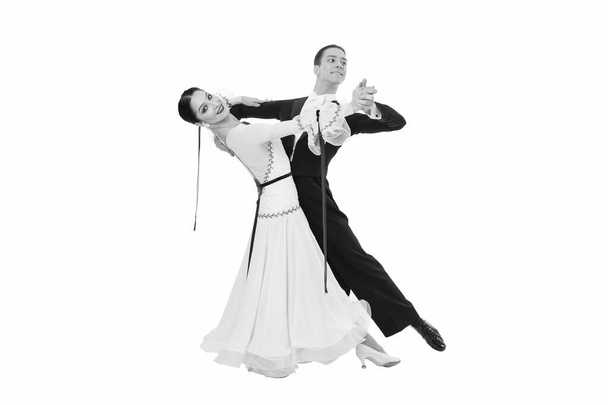 ballrom dance couple in a dance pose isolated on white bachground - Fotó, kép