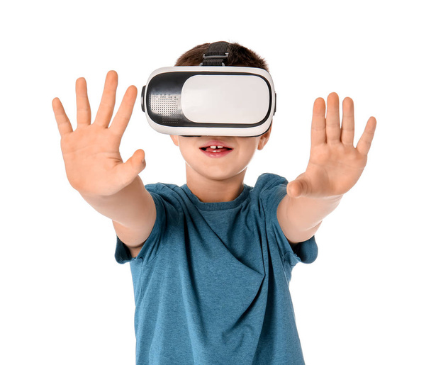 Little boy with virtual reality glasses on white background - Фото, зображення
