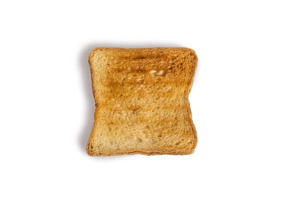 Раск хлеб изолирован на белом фоне. Вкусный жареный хлеб "Золотой тост"
 - Фото, изображение