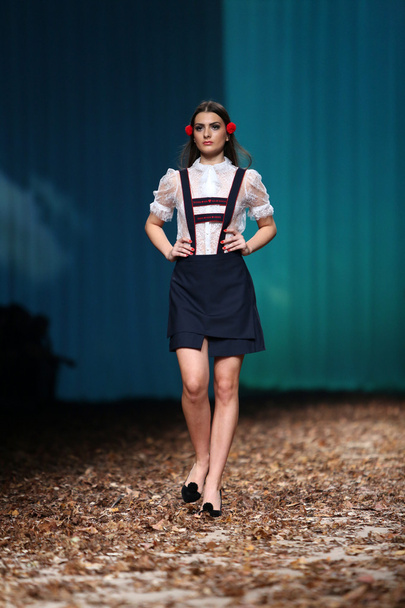 Fashion model wearing clothes designed by Borna and Fils on the Cro a Porter show - Foto, afbeelding