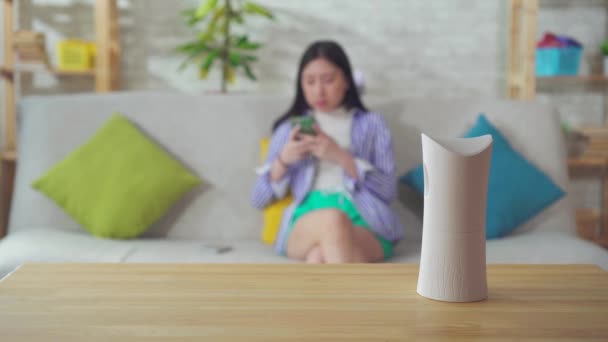 a close-up of an automatic spray air freshener at home - Filmagem, Vídeo