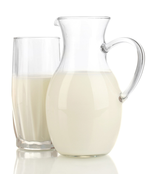 Milk in jug and glass isolated on white - Foto, imagen