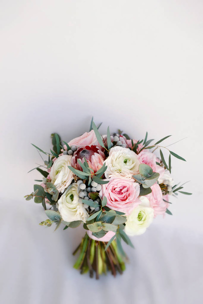 Wedding flowers, bridal bouquet closeup. Wedding invitation card template, copy space - Photo, Image