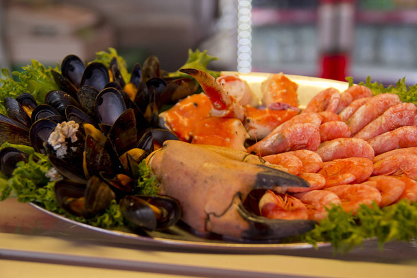 Delicious and fresh seafood on the dish - Photo, Image