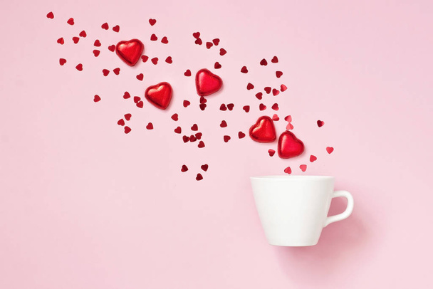 Valentine day greeting card with  coffee cup and hearts  sweet candy - Fotó, kép