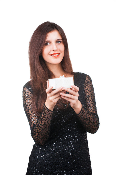 Girl holding a white box with a gift - Valokuva, kuva