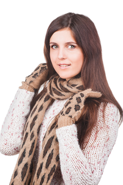 Portrait of a young girl in white sweater, scarf and mittens - Foto, Bild