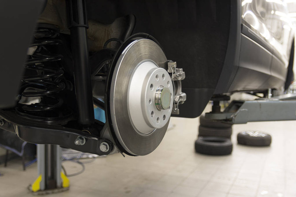 Car brake caliper close-up. Rear brakes of a modern car. technical photography. - Foto, Imagem
