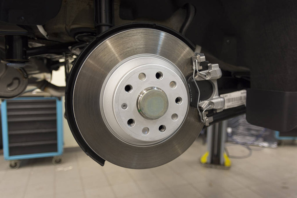 Car brake caliper close-up. Rear brakes of a modern car. technical photography. - Valokuva, kuva