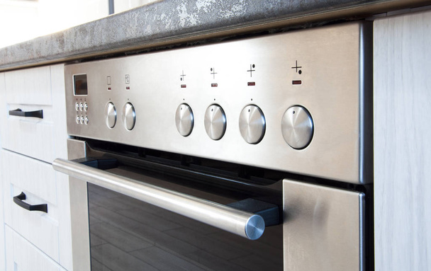 Kitchen modern oven. Kitchen equipment. Interior - Fotó, kép