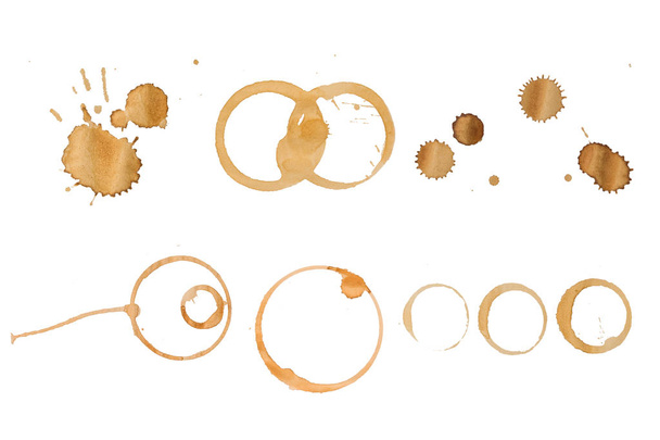 Collection of different coffee stains on a white background. - 写真・画像