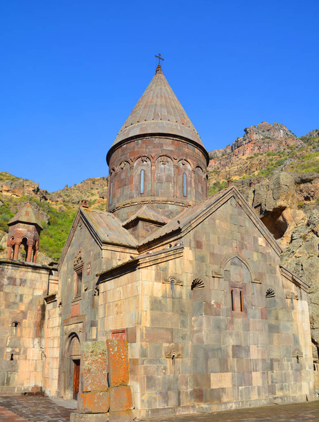 KOTAYK ARMENIA 09 15 19: Geghard is a medieval monastery in the Kotayk province of Armenia, carved out of the adjacent mountain. It is listed as a UNESCO World Heritage Site. - Foto, Imagem