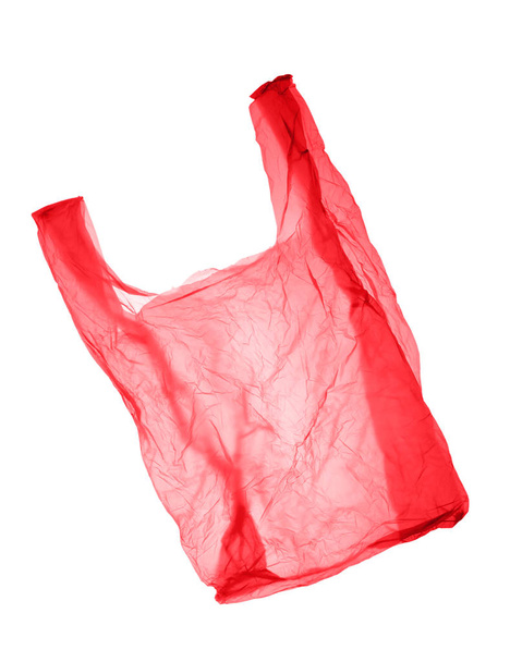 Red-pink plastic bag on white background. Isolated - Foto, Imagen