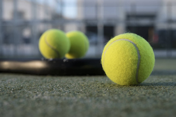 paddle tennis objects in court, racket, balls and net - Φωτογραφία, εικόνα