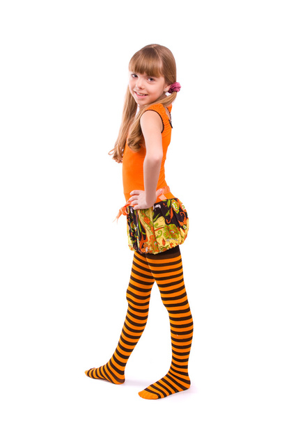 Little girl wearing orange dress - 写真・画像
