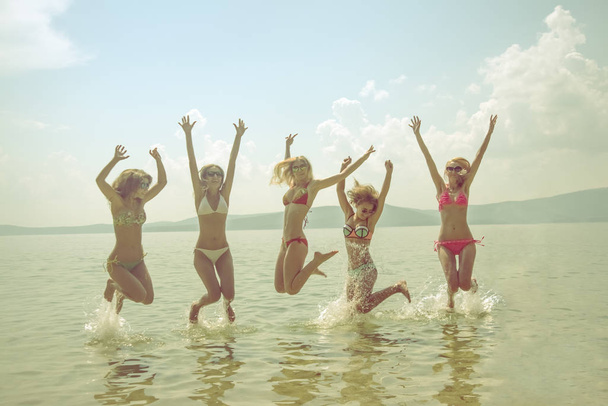 view of Group of Friends Having Fun on Tropical Beach in  summer. summer time - Photo, Image