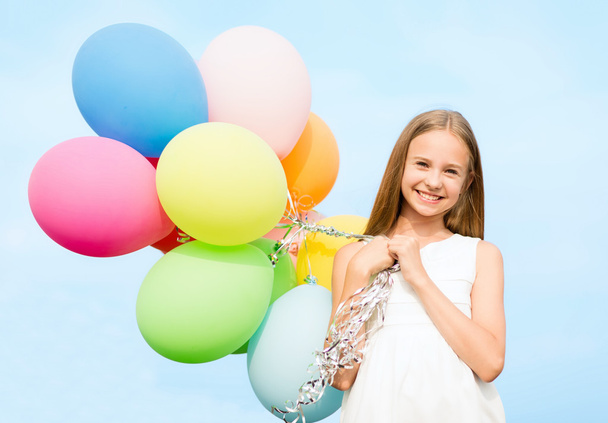 Happy girl with colorful balloons - Foto, Bild