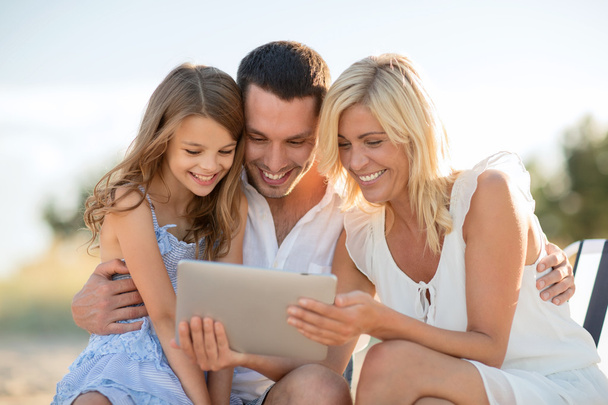 Happy family with tablet pc taking picture - Zdjęcie, obraz