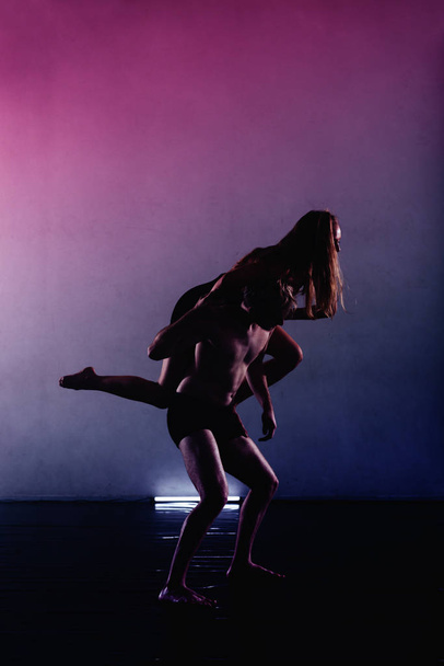 Young ballet couple during a dance practice at the studio - Photo, Image