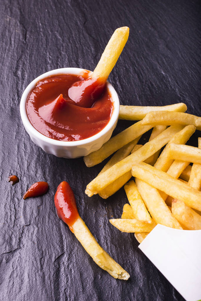 meal with ketchup and fries - Фото, зображення