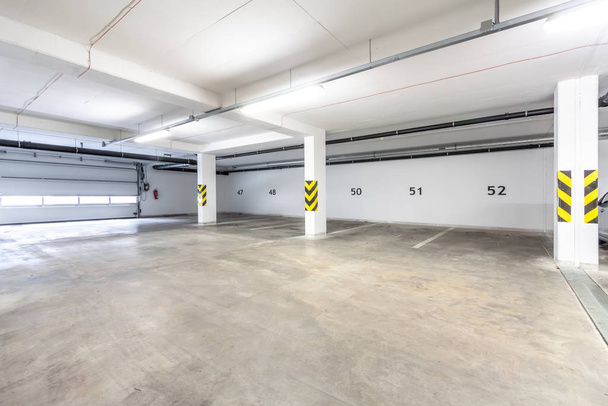 A large empty room - garage parking for cars - Photo, Image