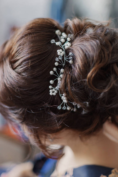Very beautiful hairstyle with a diadem in the hair. - Photo, Image