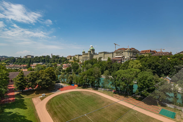 Bern, Switzerland - July 26, 2019: Panoramic view of the squares, streets and buildings of historical part of Swiss capital - Фото, зображення