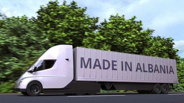 Сучасна електрична напівпричепна вантажівка з текстом "Made In Albania" збоку. Албанський імпорт або експорт пов'язані 3d рендеринга - Фото, зображення