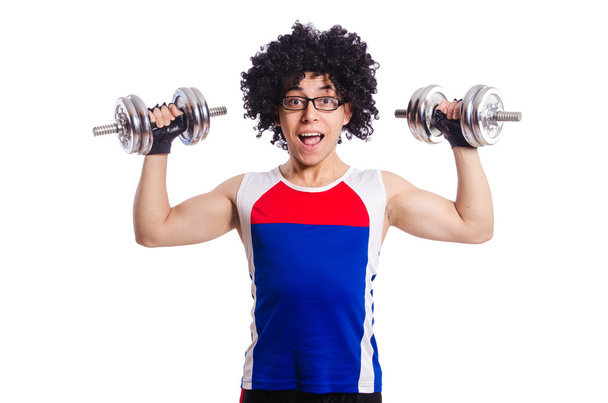 Hombre divertido haciendo ejercicio con pesas - Foto, Imagen