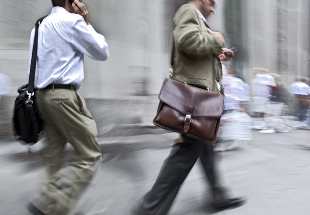 motion blurred business people walking on the street - Foto, Bild