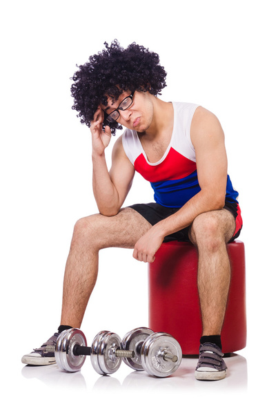 Funny man exercising with dumbbells - Фото, зображення